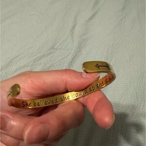 Gold colored adjustable bangle